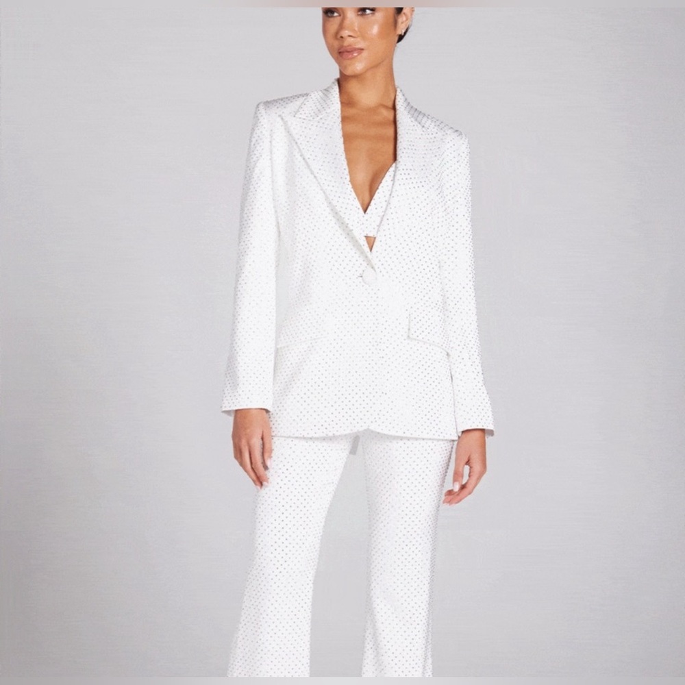 Kira Set:
White Studded Women's Jacket and Pants comes with dust bag
